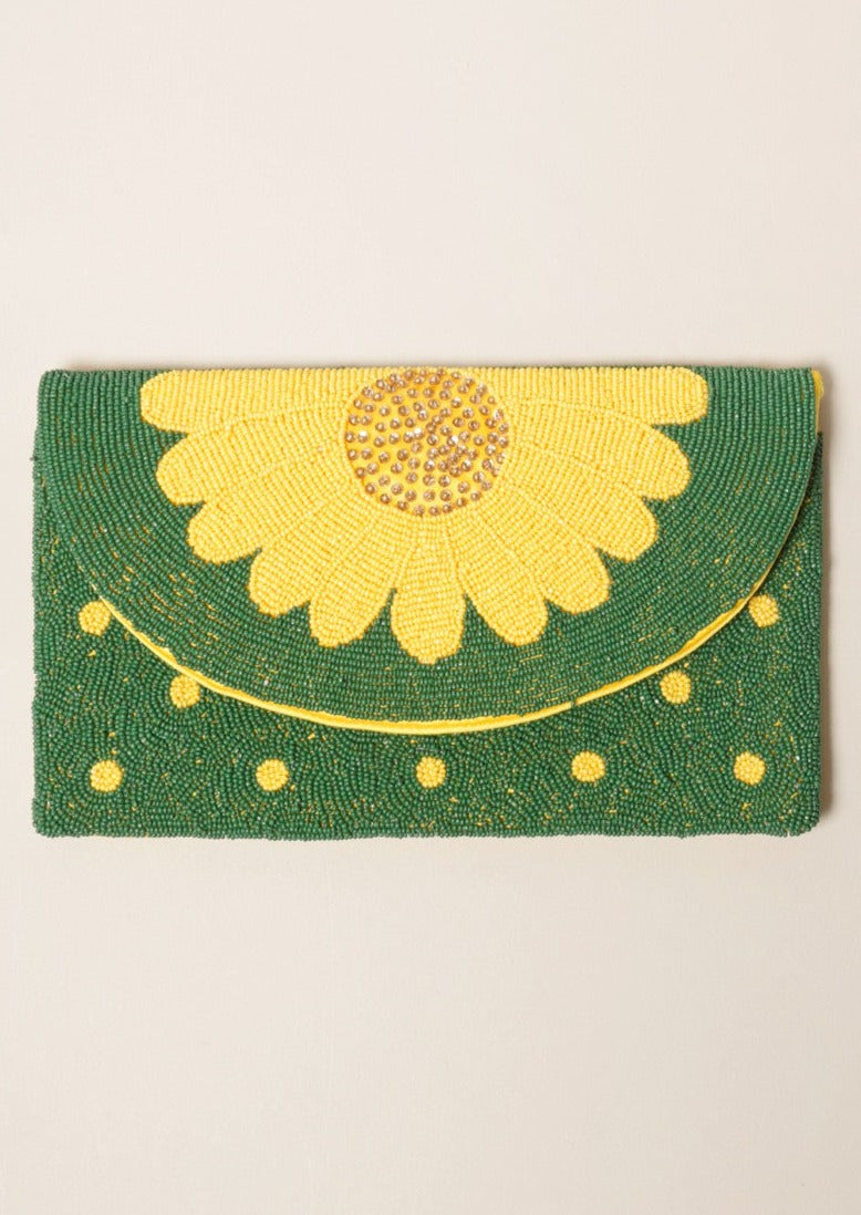 Green & Yellow SunFlower Seed Bead Handbag-Stand out from the crowd with this unique sunflower handbag made with seed beads and can be worn as a crossbody, shoulder bag or clutch!

-Cali Moon Boutique, Plainville Connecticut