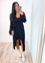 'Night Angel' Black Wrap Knit Sweater Dress-A super flattering AND comfortable sweater dress is an instant yes! This dress features a stretchy ribbed knit fabric that isn't too clingy. The functional tie wrap front allows you to make it looser or more fitted to your liking. The asymmetrical high low design of the skirt does all the styling for you! Perfect for parties and semi casual events! -Cali Moon Boutique, Plainville Connecticut