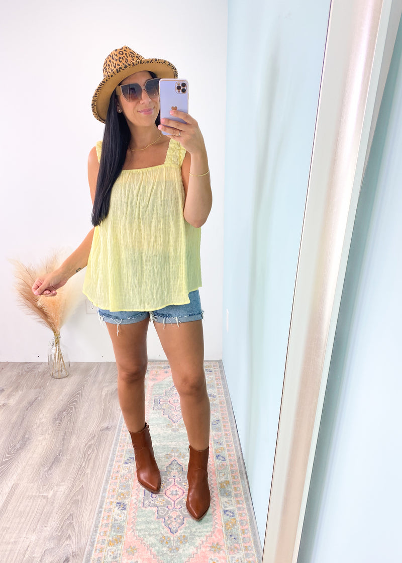'The Strand' Lemon Shirred Babydoll Tank Top-This lemon color relaxed babydoll top is so comfortable to wear all day/night! Pairs well with shorts and long denim. Pair with white denim for an effortlessly breezy Summer look. -Cali Moon Boutique, Plainville Connecticut
