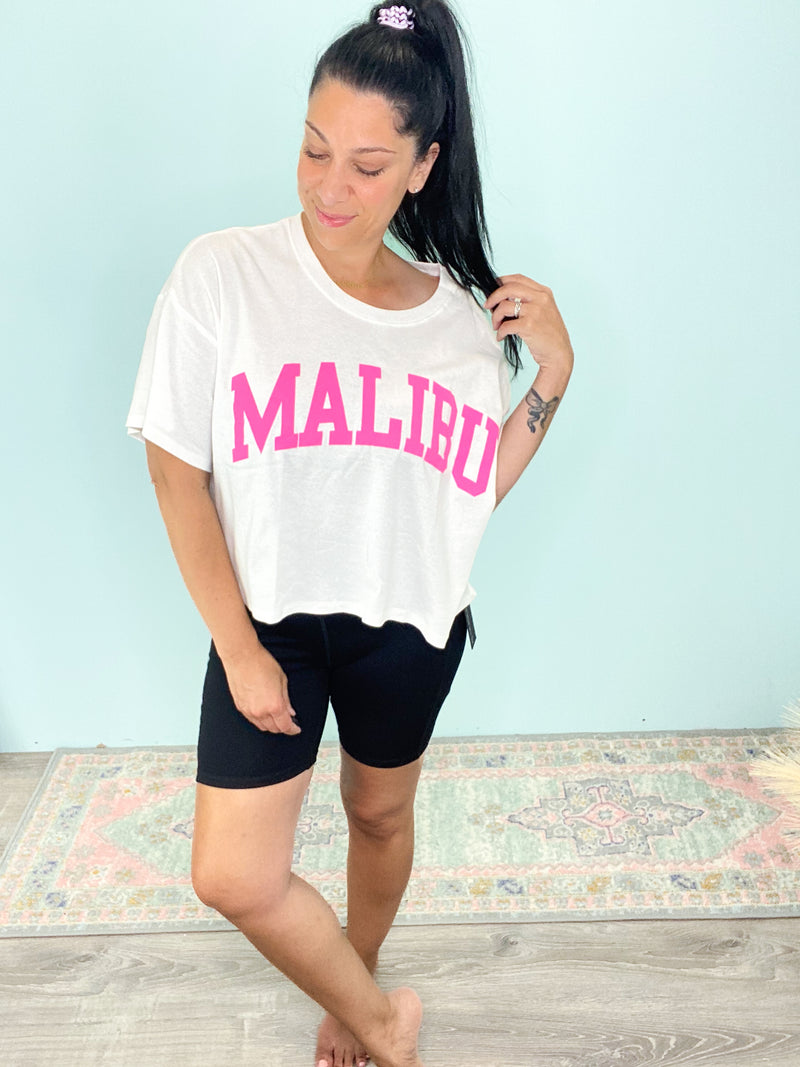 'Malibu' Oversized Semi Cropped Graphic Tee Shirt-Channeling warm weather and waves! This short sleeve cropped graphic tee is simple but adorable! It has a super soft cotton fabric with a Malibu graphic in Hot Pink. It's a semi crop silhouette and looks so cute with high waist jeans & comfy joggers! A perfect throw on and go tee!-Cali Moon Boutique, Plainville Connecticut