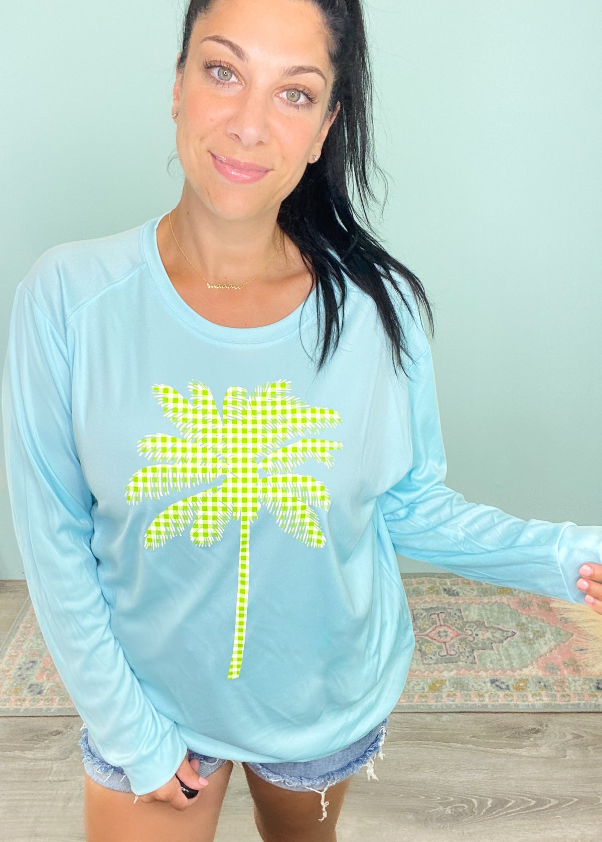 Aqua 'Gingham Palm Tree' UPF 50+ Swim & Sun Long Sleeve Top-Made with UPF 50+(Ultraviolet Protection Factor), this top is designed to protect 98% of the sun's rays. UPF measures both UVB and UVA rays( while SPF measures only UVB). Not to mention the adorable gingham printed palm tree & gorgeous aqua or coral colors to choose from! Yass Beach!-Cali Moon Boutique, Plainville Connecticut