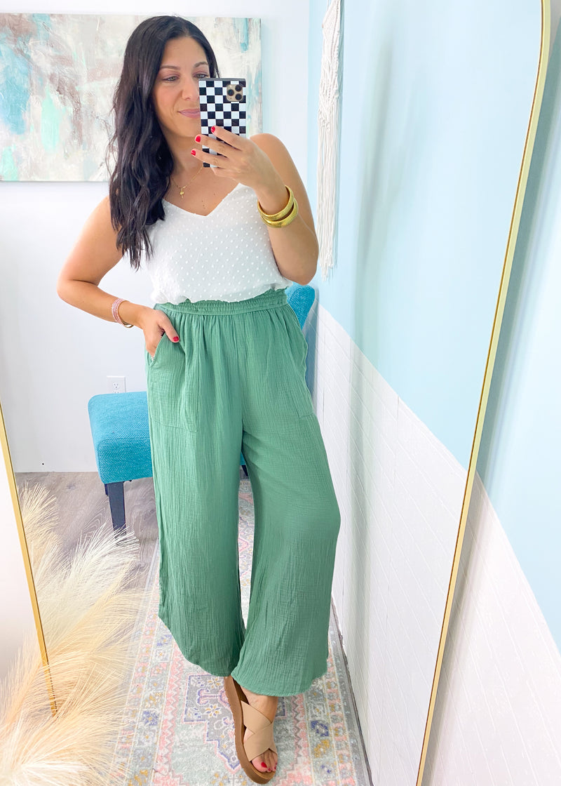 'Many Travels' Sage Crinkle Gauze Cropped Pants-It doesn't get much comfier than these crinkle gauze cropped pants! The lightweight fabric is perfect for Summer time and the gorgeous Sage color can be paired with all your Summer brights and whites! The elastic waistband is comfy and not super tight making them long travels day friendly!-Cali Moon Boutique, Plainville Connecticut