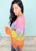 'Almost Famous' Ombre Multi Color Crochet Bell Sleeve Top-Oversized to perfection, this crochet top doubles as a swimsuit coverup or easy Summer top. The multicolor design does all the work for you! Throw on your favorite bottoms or bathingsuit and you are ready for the flashing lights! -Cali Moon Boutique, Plainville Connecticut