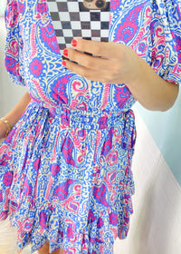 'Sweet Tea' Pink & Blue Paisley Puff Sleeve Dress-This dress is as sweet as can be with a classic paisley print accented with puff sleeves and ruffle trims. The waist is self cinching! Meaning, you can make the waist as loose or cinched in as you would like for different looks. Great for Summer weddings or day trips paired with sneakers!-Cali Moon Boutique, Plainville Connecticut