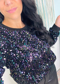 'The Diva' Multicolor Sequin Velvet Crewneck Sweatshirt-Make a bold statement but feel like you're in loungewear all at the same time! The comfort of this sweatshirt is unexpected but very welcomed! The base of this crewneck is velvet with disc style sequins on top. The nonstop shimmer of the multi color is gorgeous! The comfy part is the soft mesh inner lining.-Cali Moon Boutique, Plainville Connecticut