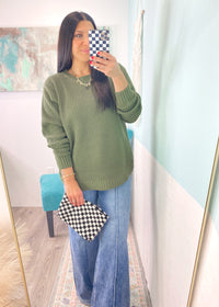 *DOORBUSTER* 'Wendi' Olive Green Waffle Knit Round Neck Sweater-This waffle knit sweater is a must have classic silhouette! The split hem makes it easy to tuck in but also looks cute untucked with the rounded bottom hem. Dress this sweater up with skirts or jeans and boots and layered jewelry or you can wear it super casual with jeans and sneakers. -Cali Moon Boutique, Plainville Connecticut