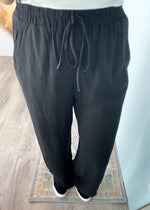 'Eliza' Black Linen Tank & Wide Leg Pant Set-This classic black linen set can be mixed and matched and worn all year! The super soft and high quality linen will keep you comfy all day long. The double layered tank can be worn alone casual and dressed up. Add any color tank for a cool summer time look and add your favorite tee and denim jacket for Fall looks! 
-Cali Moon Boutique, Plainville Connecticut