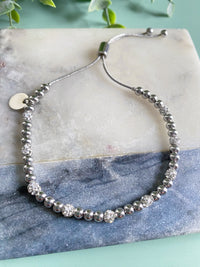 3MM Silver Two Tone Solid & Rhinestone Bead Adjustable Bracelet-A little bling, a little basic! This two tone beaded adjustable bracelet has the best of both worlds. The rhinestone filled beads give off tons of shine.-Cali Moon Boutique, Plainville Connecticut