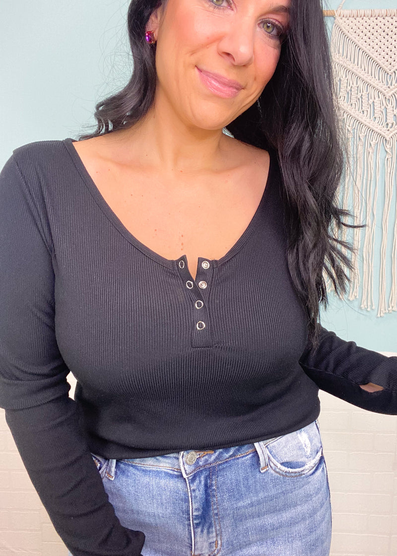'Hailey' Black Snap Button Ribbed Henley with Thumbholes-Every wardrobe should have a classic henley! Wear alone or as a layering piece. A year round top.
-Cali Moon Boutique, Plainville Connecticut