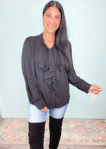 'Out of Office' Black Ruffle & Tie Front Blouse-This Black ruffle front blouse is a little bit of business & a little bit of fun! The waterfall ruffle front adds an element of fun while the overall structured look is still office friendly! Tuck in or wear untucked for office to night looks!-Cali Moon Boutique, Plainville Connecticut