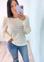 'On the Agenda' Ivory Textured Puff Sleeve Top-For this top, it's all in the details! Textured & ruched fabric, puff shoulders and longline fitted cuffs. Tuck this in to show off the shoulder details or wear it untucked with the texture details doing all the work! Relaxed & comfy fit for all day wear.-Cali Moon Boutique, Plainville Connecticut