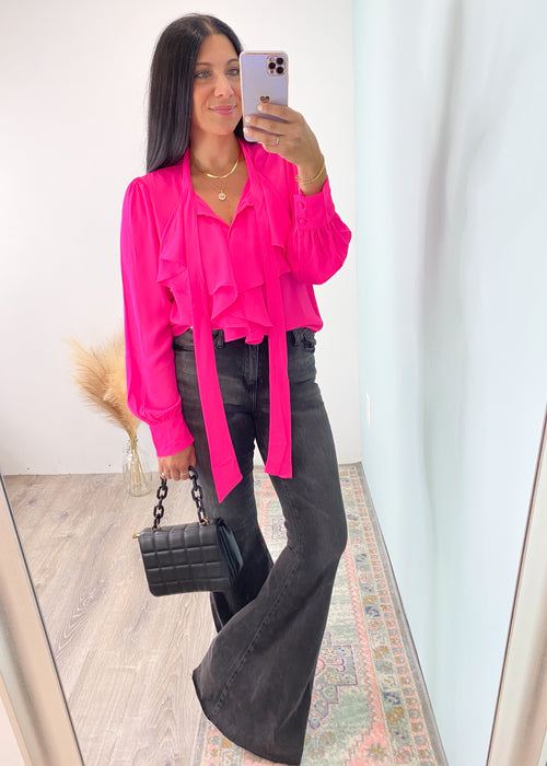 'Out of Office' Hot Pink Ruffle & Tie Front Blouse-This hot pink ruffle front blouse is a little bit of business & a little bit of fun! The waterfall ruffle front adds an element of fun while the overall structured look is still office friendly! Tuck in or wear untucked for office to night looks!-Cali Moon Boutique, Plainville Connecticut