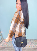 Black Braided Front Saddle Crossbody Bag-This crossbody is small enough to comfortably wear all day with enough space for all your must haves. Plus, it's ultra cute & chic in black that will match with everything!

-Cali Moon Boutique, Plainville Connecticut