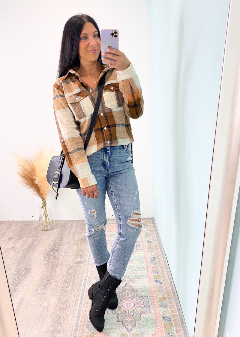 Black Braided Front Saddle Crossbody Bag-This crossbody is small enough to comfortably wear all day with enough space for all your must haves. Plus, it's ultra cute & chic in black that will match with everything!

-Cali Moon Boutique, Plainville Connecticut