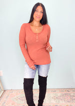 'Lee' Pumpkin Rose Ribbed Henley Top-This ribbed fitted top is a perfect layering piece for all your Fall outfits and looks just as cute on it's own. It has lots of details making it an elevated basic. The gorgeous rich pumpkin rose color pairs well with all the Fall neutrals! -Cali Moon Boutique, Plainville Connecticut