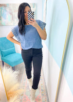 'One of a Kind' Chambray Top with Pearl Trim Sleeves-Unique & adorable, this chambray top pairs well with black jeans, white pants, colored jeans, leggings and other shades of denim! The pearl trim sleeves are sure to be a conversation starter and will add a little glam to your closet!-Cali Moon Boutique, Plainville Connecticut