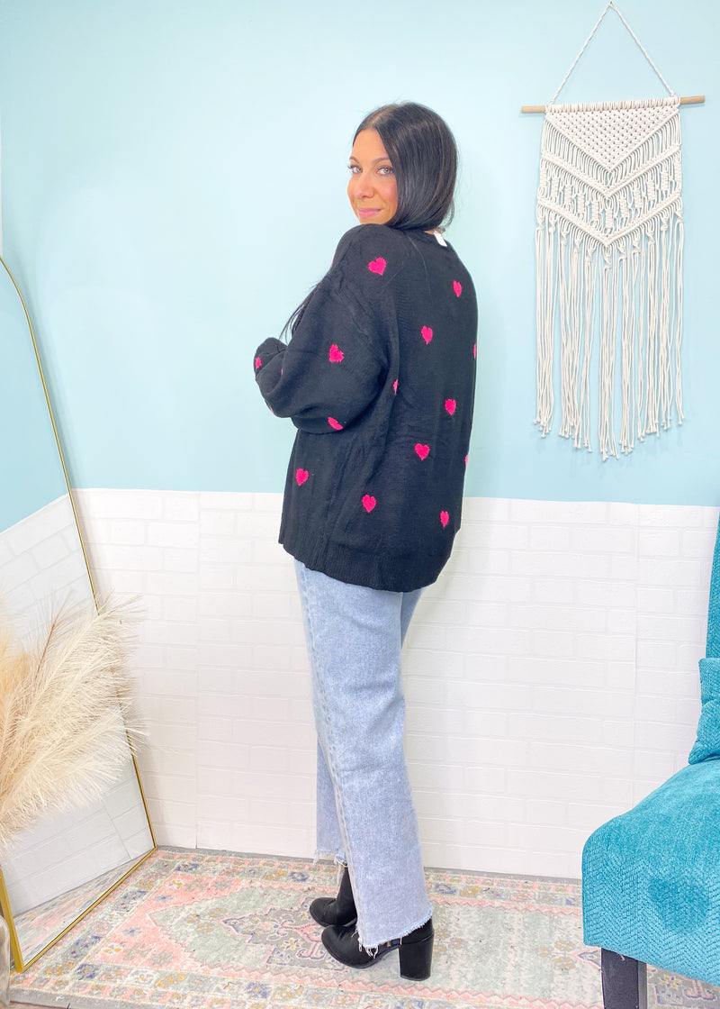 'All My Heart' Black Oversized Sweater with Hot Pink Mini Hearts-You will love the softness of this sweater with all your heart! It has tons of stretch with a&nbsp; soft "fluffy" sweater fabric and pops of hot pink hearts on front and back. Perfect for Valentine's Day or any day you need a warm sweater hug!-Cali Moon Boutique, Plainville Connecticut