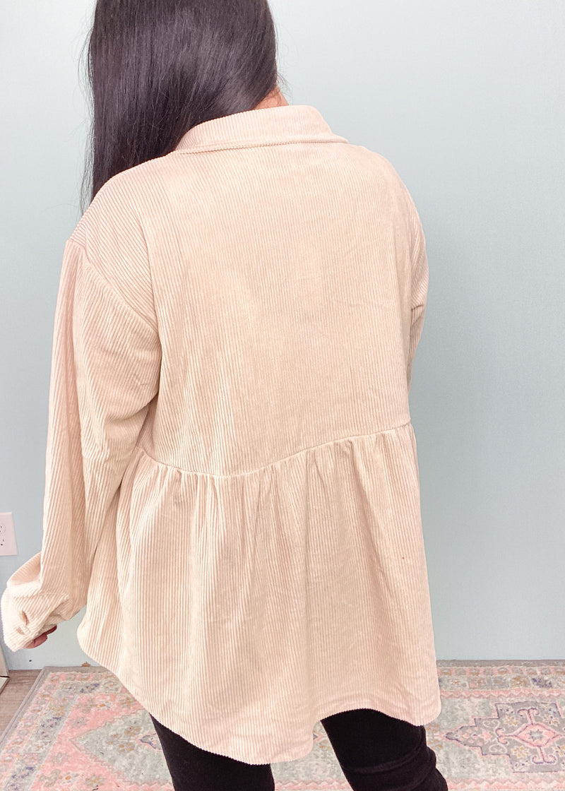 Cream Corduroy Babydoll Top-This corduroy babydoll top is unique, comfortable and can be worn a few different ways! The neutral cream color can be worn with all the rich hues of Fall, all shades of denim and black! It's also work friendly! Wear it as a buttoned up top or layering piece.-Cali Moon Boutique, Plainville Connecticut