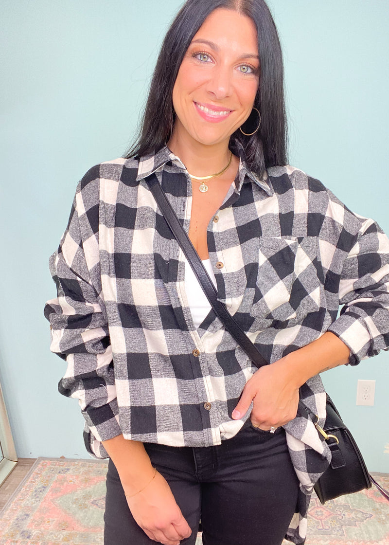 Gray & Black Buffalo Plaid Longline Oversized Shirt-Buffalo plaids are basically a Fall uniform! This black and gray buffalo plaid oversized shirt has a long length style with pockets and buttons that can be worn so many ways (see pics for inspo). A fall must have!-Cali Moon Boutique, Plainville Connecticut