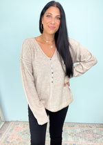 Oatmeal Henley Button Down Soft Sweater-This oatmeal soft sweater is guaranteed to be one of your new Fav Fall rotation sweaters! It features the softest fabric with stretch to be worn tucked in, out or knotted. The functional henley buttons can be worn buttoned or unbuttoned for different looks from day to night. Also looks cute off the shoulder! -Cali Moon Boutique, Plainville Connecticut