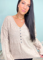 Oatmeal Henley Button Down Soft Sweater-This oatmeal soft sweater is guaranteed to be one of your new Fav Fall rotation sweaters! It features the softest fabric with stretch to be worn tucked in, out or knotted. The functional henley buttons can be worn buttoned or unbuttoned for different looks from day to night. Also looks cute off the shoulder! -Cali Moon Boutique, Plainville Connecticut