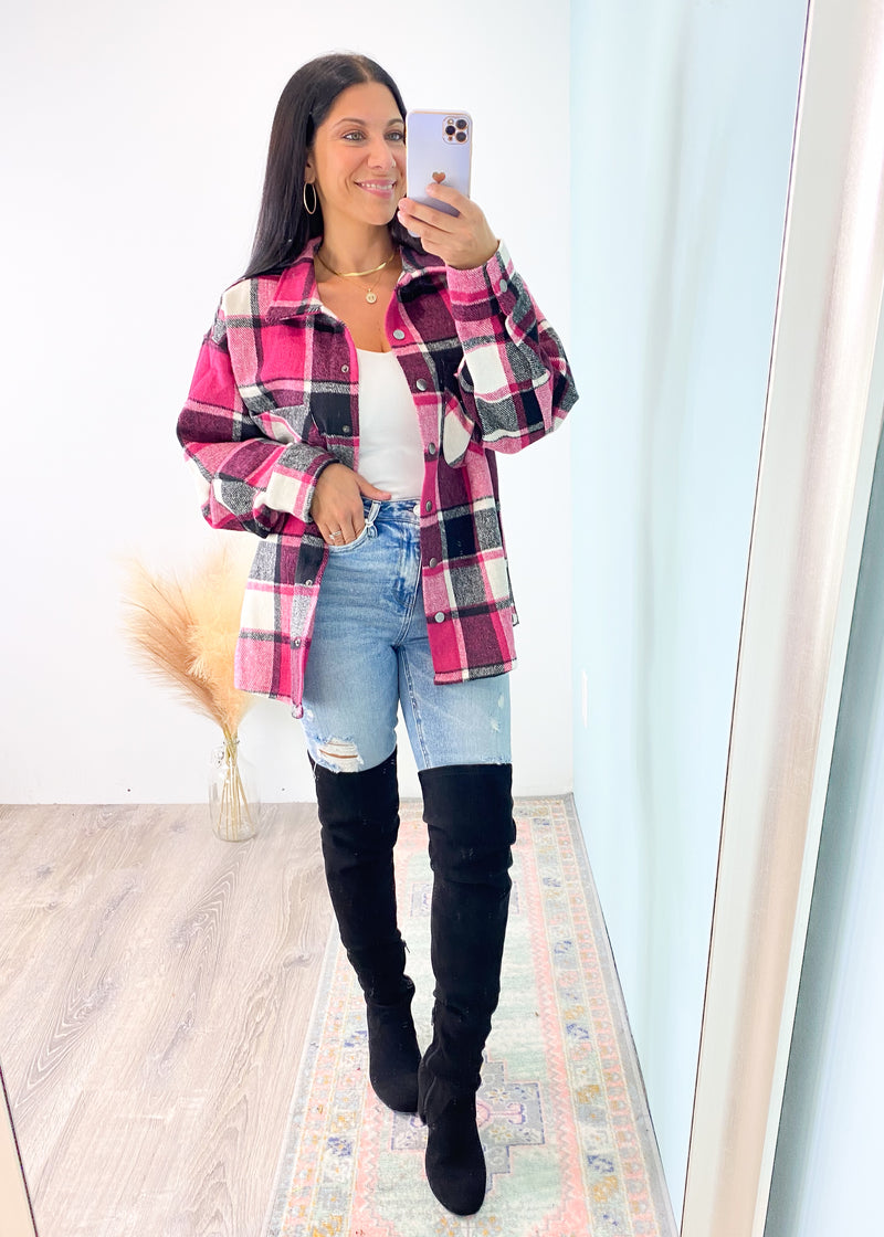 Magenta & Black Plaid Flannel Shacket-This shacket isn't like the other Fall shackets! It features a striking black, magenta & white plaid. The flannel outer fabric thick enough to keep you warm as a jacket, but can still be worn tucked in as a top. A unique Fall piece! -Cali Moon Boutique, Plainville Connecticut