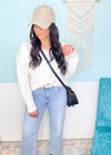 'Charmed' Ivory Cable Sleeve Soft Sweater-Classic cable knit design is perfectly placed in a tonal sleeve on this super soft and cozy sweater. The loose, rounded neckline allows you to wear it regular or slightly off shoulder. Perfect for: Business casual, night out with boots/jeans, everyday with leggings/jeans with sneakers-Cali Moon Boutique, Plainville Connecticut