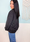 'Petra' Black Vintage Washed Snap Button Pullover-An everyday staple with personality! The vintage washed fabric is super soft and cozy. The relaxed fit is an easy throw on and go with jeans and leggings perfect for Spring transition but also can be worn in Fall/Winter!-Cali Moon Boutique, Plainville Connecticut