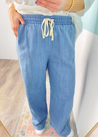 'Santa Monica' Chambray Drawstring Cropped Wide Leg Pants- Three Bird Nest-From the Three Bird Nest Brand! These slouchy, wide leg chambray pants are every casual loving girl's dream! They feature a super soft and moveable chambray denim fabric, comfortable elastic waistband, a boho baggy fit without being too oversized and adorable attention to detail additions like the panel side and scalloped leg opening. We dare you to not want to wear them daily!-Cali Moon Boutique, Plainville Connecticut