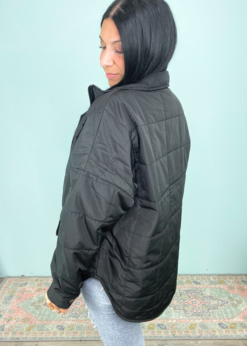 'Caught in the Middle' Black Lightweight Quilted Puffer Jacket-The perfect in between season changing jacket does exist! This Black lightweight quilted puffer jacket is lightweight enough for those days where weather changes a few times and can be worn with long or short sleeves underneath. A Fall must have! -Cali Moon Boutique, Plainville Connecticut