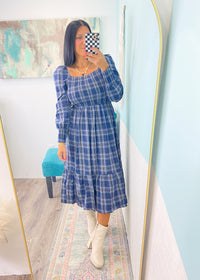 'Verona' Navy Plaid Puff Sleeve Midi Dress-This plaid midi dress is about as cute as you can get for Fall! Transform it from the office with flats to a night out with tall boots &amp; a leather jacket. The smocked bodice makes it as comfy as it is cute!&nbsp;-Cali Moon Boutique, Plainville Connecticut