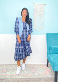 'Verona' Navy Plaid Puff Sleeve Midi Dress-This plaid midi dress is about as cute as you can get for Fall! Transform it from the office with flats to a night out with tall boots &amp; a leather jacket. The smocked bodice makes it as comfy as it is cute!&nbsp;-Cali Moon Boutique, Plainville Connecticut