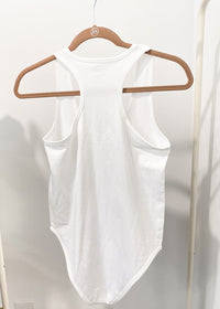 'Sara' White Scoopneck Racerback Seamless Bodysuit-This seamless racerback bodysuit is extremely soft, stretchy and makes the perfect non bulky layering piece. Wear alone in the Summer and layer in the cooler months.-Cali Moon Boutique, Plainville Connecticut