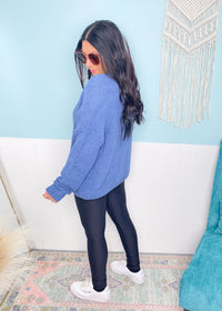 'On a Cloud' Denim Blue Ultra Soft Chenille Button Front Cardigan-This soft as a cloud cardigan in a beautiful denim blue features slouchy, front pockets and a draped look for a casual chic look every time. You will be able to mix &amp; match for so many in or out of the office looks. Wear it slightly off the shoulder, buttoned or unbuttoned for all your different outfits.-Cali Moon Boutique, Plainville Connecticut