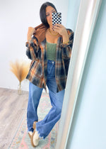 'Fall Day' Oversized Black/Pecan Plaid Fleece Shacket with Hood-The oversized plaid shacket that dreams are made of! Warm and cozy colors on a brushed flannel fabric topped off with a hood for both function and design! Oversized to wear slouchy and casual all Fall/Winter long! 

-Cali Moon Boutique, Plainville Connecticut