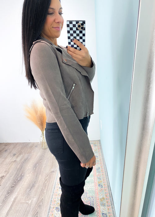 Lightweight Cropped Mushroom Faux Suede Moto Jacket-This neutral colored faux suede moto jacket has a luxurious and smooth fabric with comfy stretch and moto hardware details! What's not to love?! The color will pair with both neutral and rich colors of the cooler seasons! -Cali Moon Boutique, Plainville Connecticut