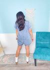 'The Cutie' Vintage Washed Soft Denim Romper-It's all in the name! This cute as can be tencel denim romper features a vintage washed moveable, non rigid denim fabric. It has side pockets, a loose fit and functional front buttons giving you so many styling options! This can easily be dressed up for your Summer concerts, worn super casual for everyday and vacation ready!-Cali Moon Boutique, Plainville Connecticut