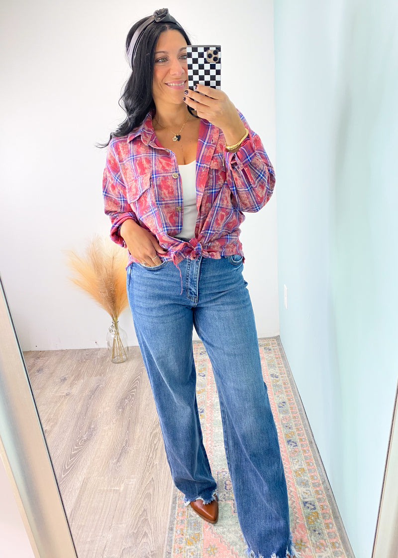'Rayna' Red Bleached Frayed Hem Plaid Flannel Shirt-This bleached plaid shirt is an adorable and & unique way to liven up your Fall plaid game! It features a multi color plaid on a red base with a vintage bleached effect, brushed fabric and fringe hem. Perfect to pair with all shades of denim and black leggings. Wear as a classic shirt or as a layering piece. -Cali Moon Boutique, Plainville Connecticut