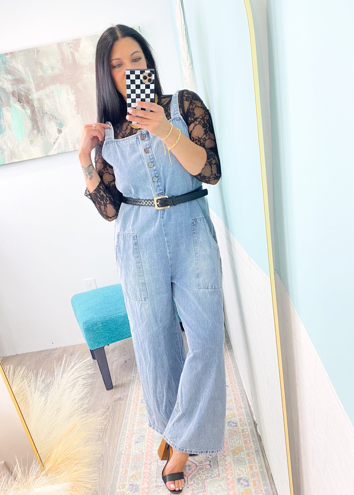 'She's All That' Wide Leg Trouser Jean Jumpsuit-This jean jumpsuit is all that and so much more! The wide leg trouser style looks good with heels, sneakers, boots &amp; sandals. The denim is non rigid which we love! Wear it alone with your fav bandeaus or layer with tanks, bodysuits, tees and long sleeve tops in the Fall/Winter. Add a belt for a more structured outfit.-Cali Moon Boutique, Plainville Connecticut