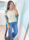 'Go Team' Camo & Cream Varsity Stripe Raglan Long Sleeve Tee-This tee is winner in our book! An ultra soft heather cream base with camo raglan sleeves &amp; varsity stripes, it will be your new all the time go to tee.-Cali Moon Boutique, Plainville Connecticut