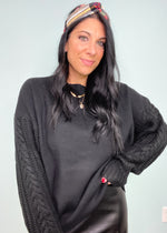 'All in the Details' Black Oversized Cable Sleeve Sweater-The unique cable knit balloon sleeves elevates this black sweater and allows you to dress it up or wear super casual. This amazingly soft sweater will be a new fav.-Cali Moon Boutique, Plainville Connecticut