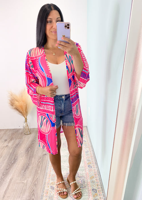 'Linked Up' Hot Pink Printed Mini Mesh Kimono-This printed kimono has a beautiful print with striking colors and can be a beach coverup and/or the finishing piece of your summer outfit! Pair with jeans & shorts as well as bathing suits!
-Cali Moon Boutique, Plainville Connecticut