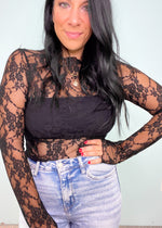 'Be Seen' Black Ruffle Trim Sheer Lace Top-Grab the layering piece of the season! This sheer black lace top can be worn under anything from sweaters, vests and blazers to dresses & jumpsuits! -Cali Moon Boutique, Plainville Connecticut