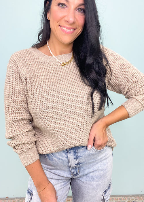 **DOORBUSTER** Heather Beige Waffle Round Neck Sweater-This waffle knit sweater is a must have classic silhouette! The split hem makes it easy to tuck in but also looks cute untucked with the rounded bottom hem. Dress this sweater up with skirts or jeans and boots and layered jewelry or you can wear it super casual with jeans and sneakers. -Cali Moon Boutique, Plainville Connecticut