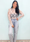 'Delicate Love' White Ruffle Trim Sheer Lace Top-Grab the layering piece of the season! This sheer white lace top can be worn under anything from sweaters, vests and blazers to dresses & jumpsuits! Wear all year! -Cali Moon Boutique, Plainville Connecticut