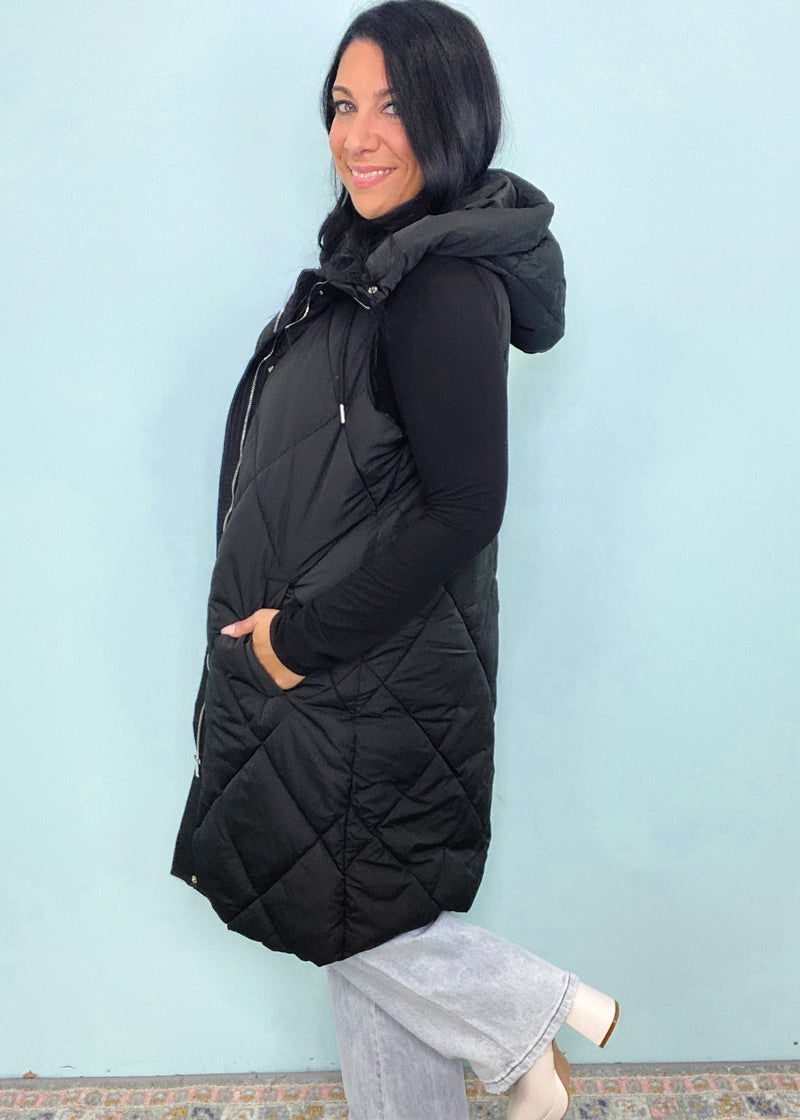 'Peyton' Black Quilted Long Puffer Vest with Hood-Stay cozy and super cute all Holiday season and beyond in this comfy lightweight knit robe that has an adorable candy cane & peppermint print! The perfect robe to wear around over your pajamas and while getting ready.-Cali Moon Boutique, Plainville Connecticut