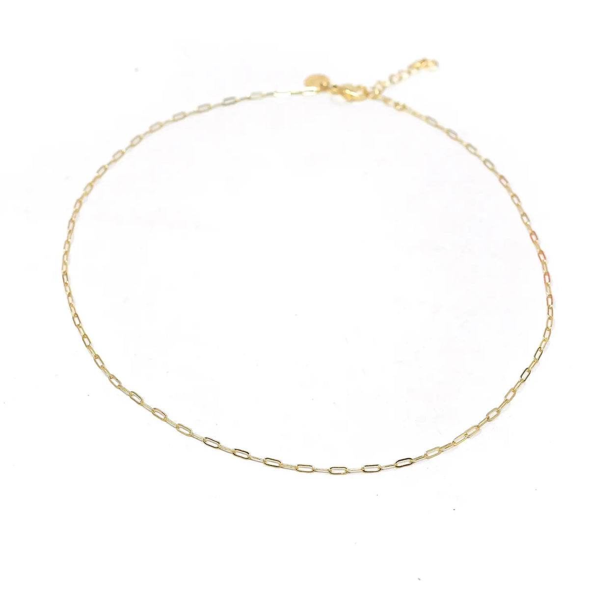 Mini Paperclip Chain Necklace-The perfect mini paperclip necklace! The mini paperclip style is adorable paired by itself as a great classic chain or paired with your favorite charm or initial charm.

-Cali Moon Boutique, Plainville Connecticut