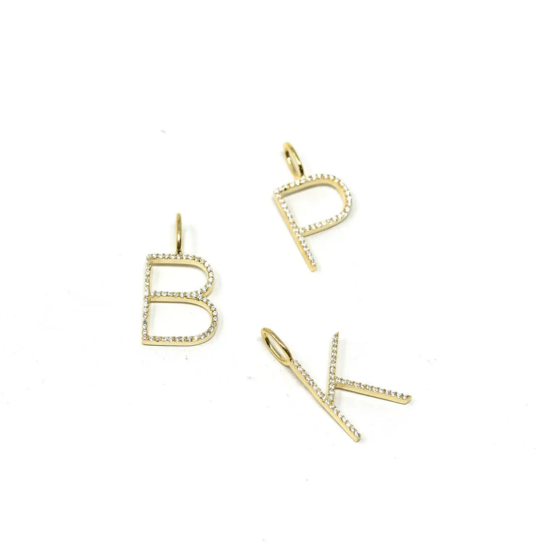 Sleek Initial Necklace Charm-These gold with crystal initial charms are thin, dainty and classic! Add a little sparkle to your necklace charms and represent yourself, kids, pets, last name, etc. -Cali Moon Boutique, Plainville Connecticut