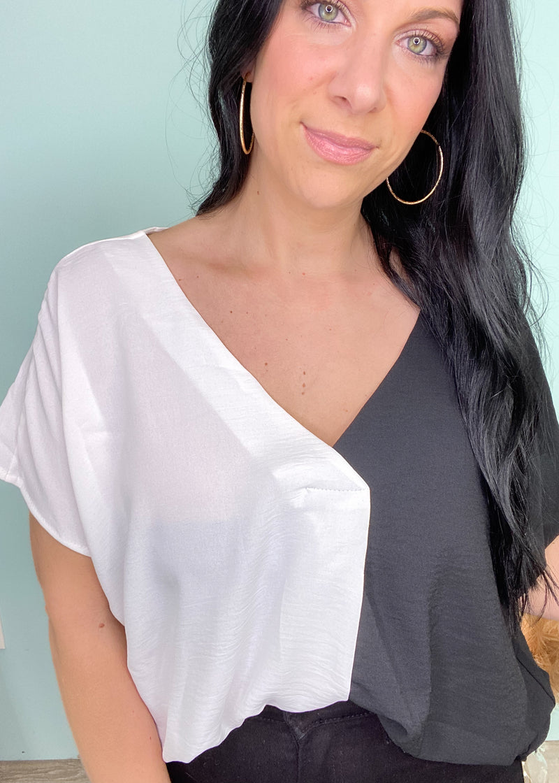'Power Couple' Black/White Colorblock Top-Black and white combos are a classic that never go out of style! This black and white colorblock top features a soft, moveable fabric that can dressed up or worn casually with denim. A great Spring and Summer top!-Cali Moon Boutique, Plainville Connecticut